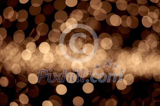 abstract golden background of christmas lights. bokeh background