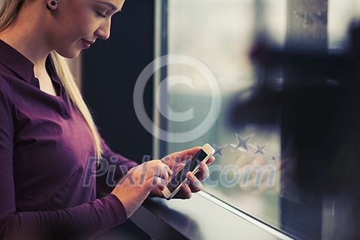 business woman at office using smart phone to check internet and type messages