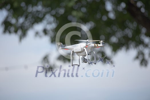 aerial photography, quadcopter drone flying over the city. New digital photo and video technology aerial photography, quadcopter drone flying over the city. New digital photo and video technology