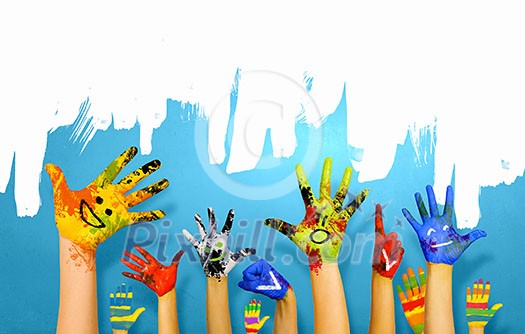 Human hands in colorful paint showing symbols Human hands in colorful paint showing symbols