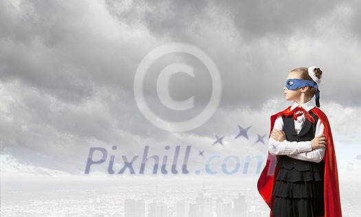 Girl of school age in super hero costume Girl of school age in super hero costume