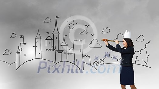 Young businesswoman in paper crown looking in spyglass Young businesswoman in paper crown looking in spyglass