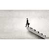 Young businessman walking up on staircase representing success concept