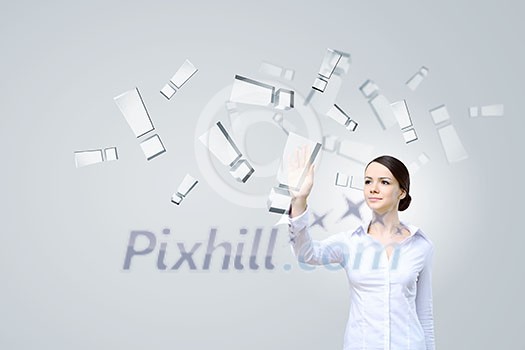 Attractive businesswoman pushing exclamation mark icon on screen Attractive businesswoman pushing exclamation mark icon on screen
