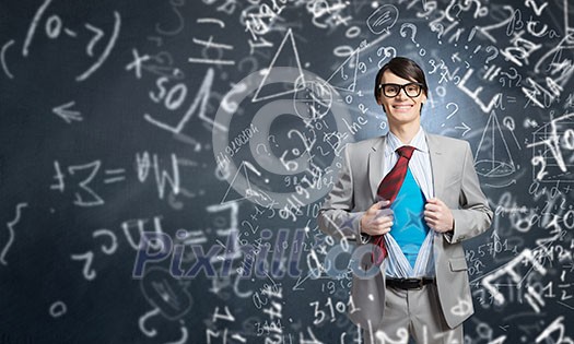 Young smiling businessman acting like super hero and tearing his shirt off Young smiling businessman acting like super hero and tearing his shirt off
