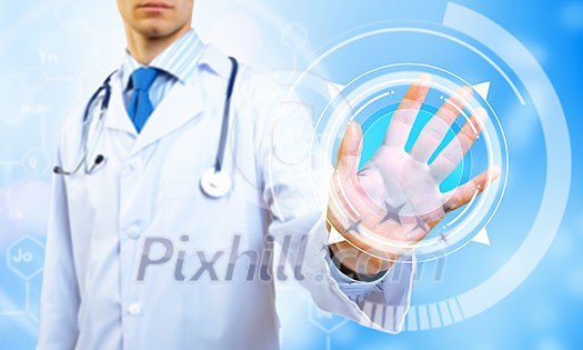 Unrecognizable male doctor with stethoscope working with virtual screen panel Unrecognizable male doctor with stethoscope working with virtual screen panel