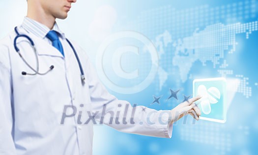 Unrecognizable male doctor with stethoscope working with virtual screen panel Unrecognizable male doctor with stethoscope working with virtual screen panel