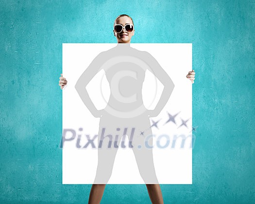 Young summer girl in glasses with white banner