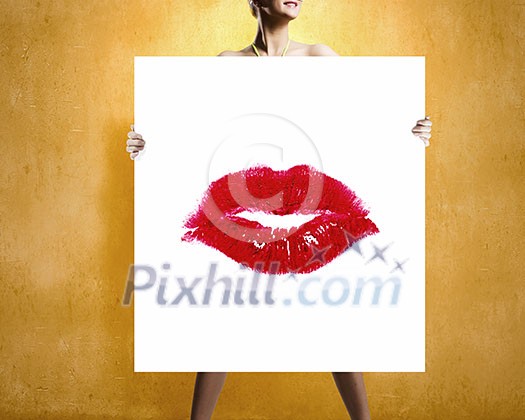 Young summer girl in glasses showing white banner with red lips Young summer girl in glasses showing white banner with red lips
