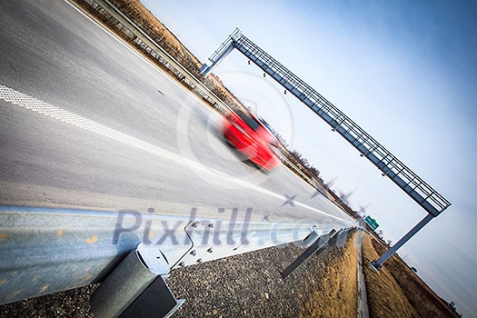 Highway traffic - motion blurred cars on a highway Highway traffic - motion blurred cars on a highway
