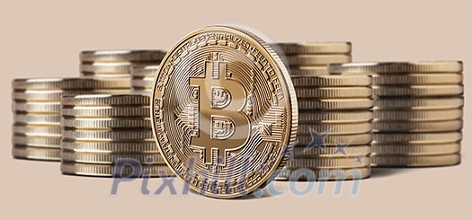 Single bitcoin coin or icon standing in front of stacks of coins on a beige background. Cryptocurrency and blockchain concept, can be used for video or site cover