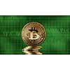 Stack of gold coins bitcoin on a green market charts background. Cryptocurrency and blockchain trading concept. Growth of the crypto currency, can be used for video or site cover or good news