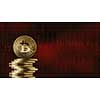 Stack of gold coins bitcoin on a red market charts background. The fall of the crypto currency, bad news. cryptocurrency and blockchain concept, can be used for video or site cover or news
