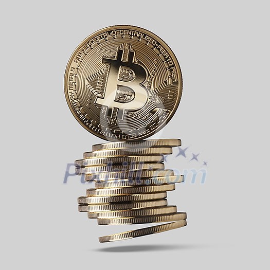 Bitcoin is a gold coin and a stack of crypto-currencies in the form of steps on a gray background. Growth and fall of the virtual currency, the high volatile currency market