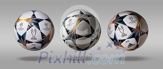 Kiev, Ukraine - February 22, 2018: Three turns the side Adidas official ball on which the stars are painted in blue and yellow colors, symbolizing the Ukrainian flag. Final of the Champions League-2018, which will be held in Kiev Kiev, Ukraine - February 22, 2018: Three turns the side Adidas official ball on which the stars are painted in blue and yellow colors, symbolizing the Ukrainian flag. Final of the Champions League-2018, which will be held in Kiev