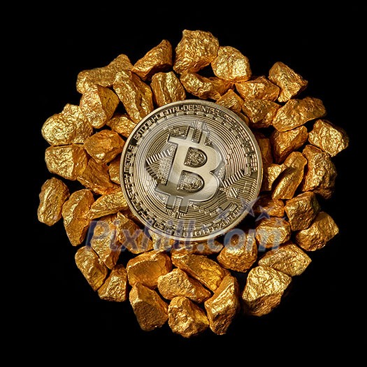 Circle from the mound of gold nuggets and from above Gold Bitcoin Coin. Bitcoin as desirable as digital gold concept. Bitcoin cryptocurrency.