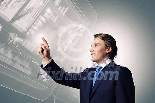 Businessman in suit touching icon of media screen Businessman in suit touching icon of media screen