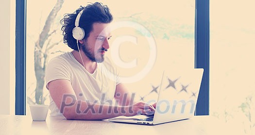 Real man Using laptop At Home Drinking Coffee Enjoying Relaxing Real man Using laptop At Home Drinking Coffee Enjoying Relaxing