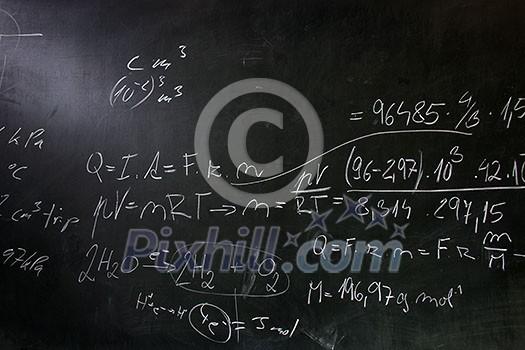 Blackboard/chalkboard during math class in front of the(color toned image) Blackboard/chalkboard during math class in front of the(color toned image)