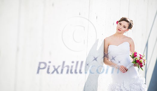 Gorgeous bride on her wedding day (color toned image; shallow DOF)