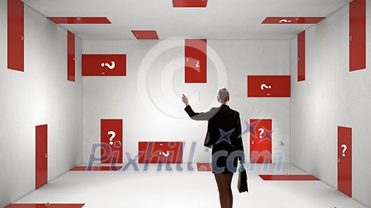 Businesswoman in room choosing one of plenty of doors Businesswoman in room choosing one of plenty of doors