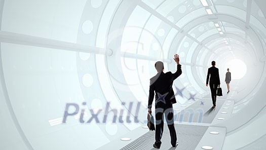 Businessman standing in virtual designed tunnel room Businessman standing in virtual designed tunnel room