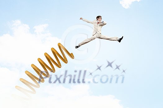 Businessman jumping on springboard as progress concept Businessman jumping on springboard as progress concept