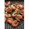 Large grilled BBQ shrimp with sweet chili sauce, green onion and lemon