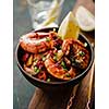 Large grilled BBQ shrimp with sweet chili sauce, green onion and lemon