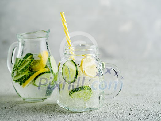 Fresh Summer Drink. Healthy detox fizzy water with lemon and cucumber in mason jar. Healthy food concept. Detox diet.