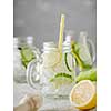 Detox diet. Fresh Summer Drink. Healthy detox fizzy lemonade with lemon and cucumber in mason jar. Healthy food concept. 