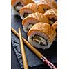 Fresh and tasty traditional Japanese sushi rolls close up