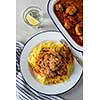 Delicious homemade meat balls in tomato sauce with spaghetti. Top view.
