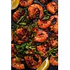 Large grilled BBQ shrimp with sweet chili sauce, green onion and lemon