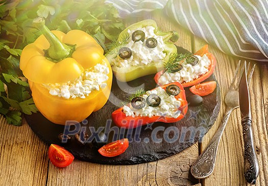 Bulgarian pepper stuffed with cheese with greens and olives