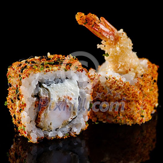 Close-up of traditional japanese sushi on a dark background with reflection. Roll with shrimp and philadelphia cheese Close-up of traditional japanese sushi on a dark background with reflection. Roll with shrimp and philadelphia cheese
