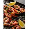 Large grilled BBQ shrimp with sweet chili sauce, green onion and lemon