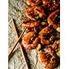 Large grilled BBQ shrimp with sweet chili sauce, green onion and lemon