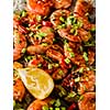 Large grilled BBQ shrimp with sweet chili sauce, green onion and lemon