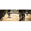 Bikers on a city street in warm evening sunlight