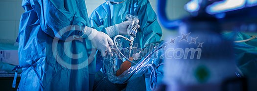 Knee surgery, Orthopedic Operation - two surgeons performing a knee surgery on a patient (shallow DOF; color toned image) Knee surgery, Orthopedic Operation - two surgeons performing a knee surgery on a patient (shallow DOF; color toned image)
