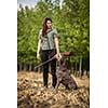 Autumn hunting season. Hunting. Outdoor sports. Woman hunter in the woods