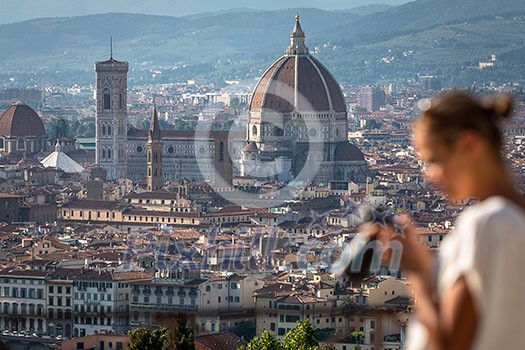 Splendid Florence, Italy, with out of focus female photographer in the foreground Splendid Florence, Italy, with out of focus female photographer in the foreground