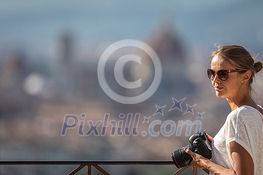 Splendid Florence, Italy, with out of focus female photographer in the foreground