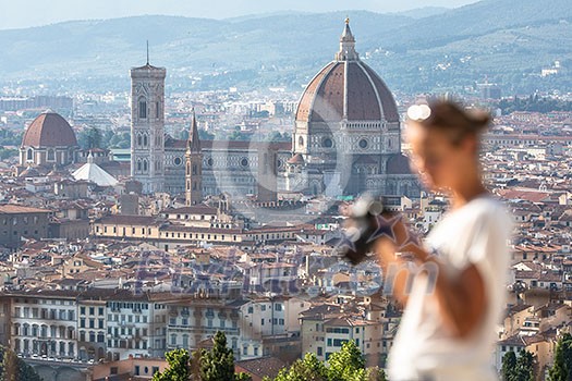 Splendid Florence, Italy, with out of focus female photographer in the foreground Splendid Florence, Italy, with out of focus female photographer in the foreground