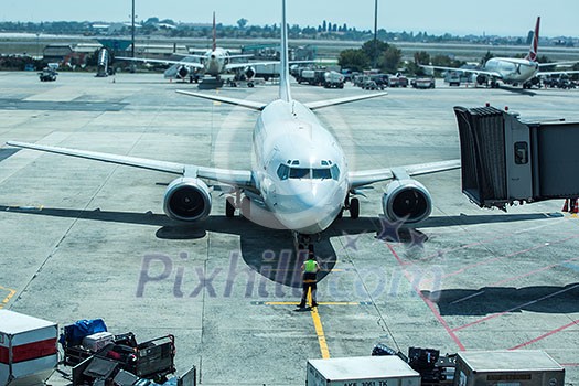 The plane at the airport on loading The plane at the airport on loading