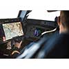 Pilot's hand accelerating on the throttle in  a commercial airliner airplane flight cockpit during takeoff