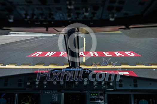 Commercial airliner airplane flight cockpit during takeoff Commercial airliner airplane flight cockpit during takeoff