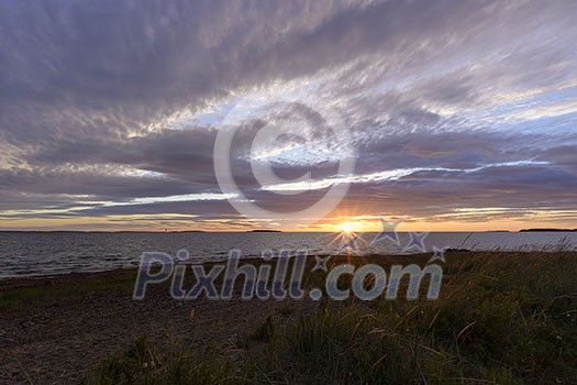 Cloudy scenery and sunset in the Baltic sea