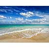 Beach holidays vacation background - beautiful beach and waves of Caribbean Sea